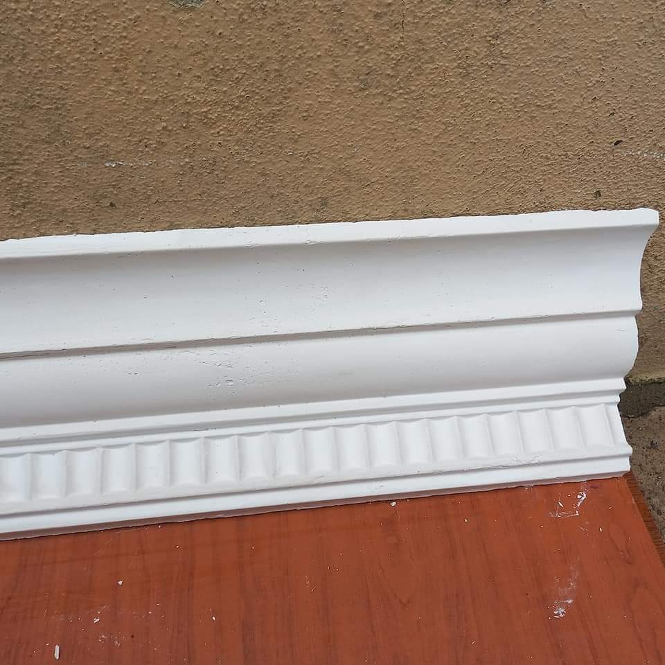 Coving with dentil block detailing