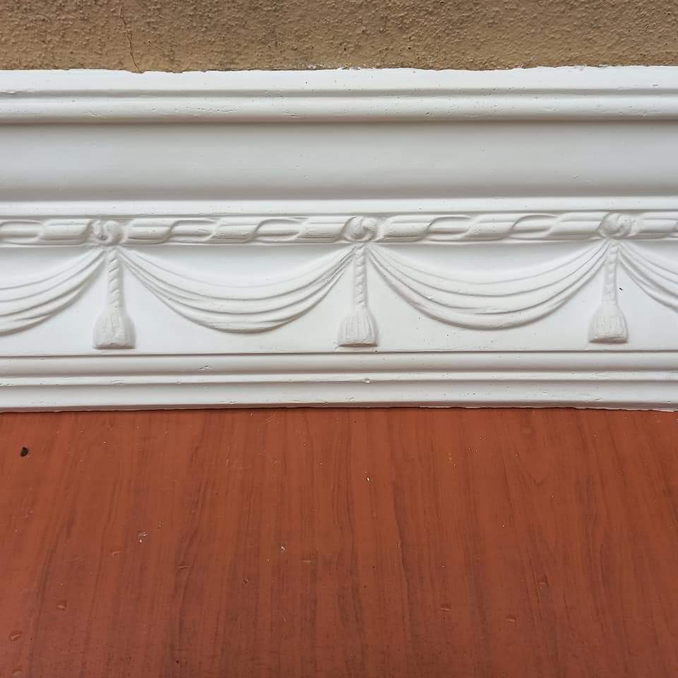 Handmade rope and tassel swag wall moulding detail
