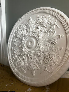 Hand-finished ceiling rose, unpainted, ready for fitting