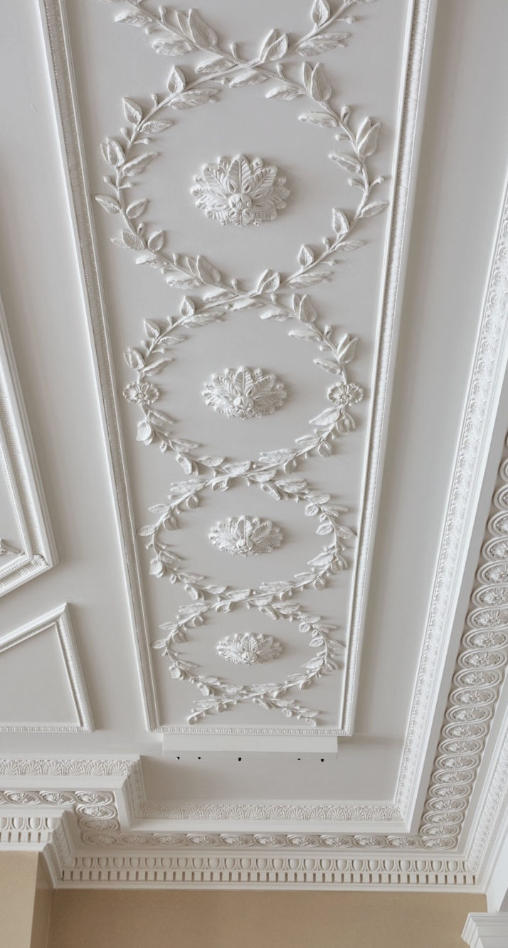 Bespoke decorative ceiling panel with wreath detailing