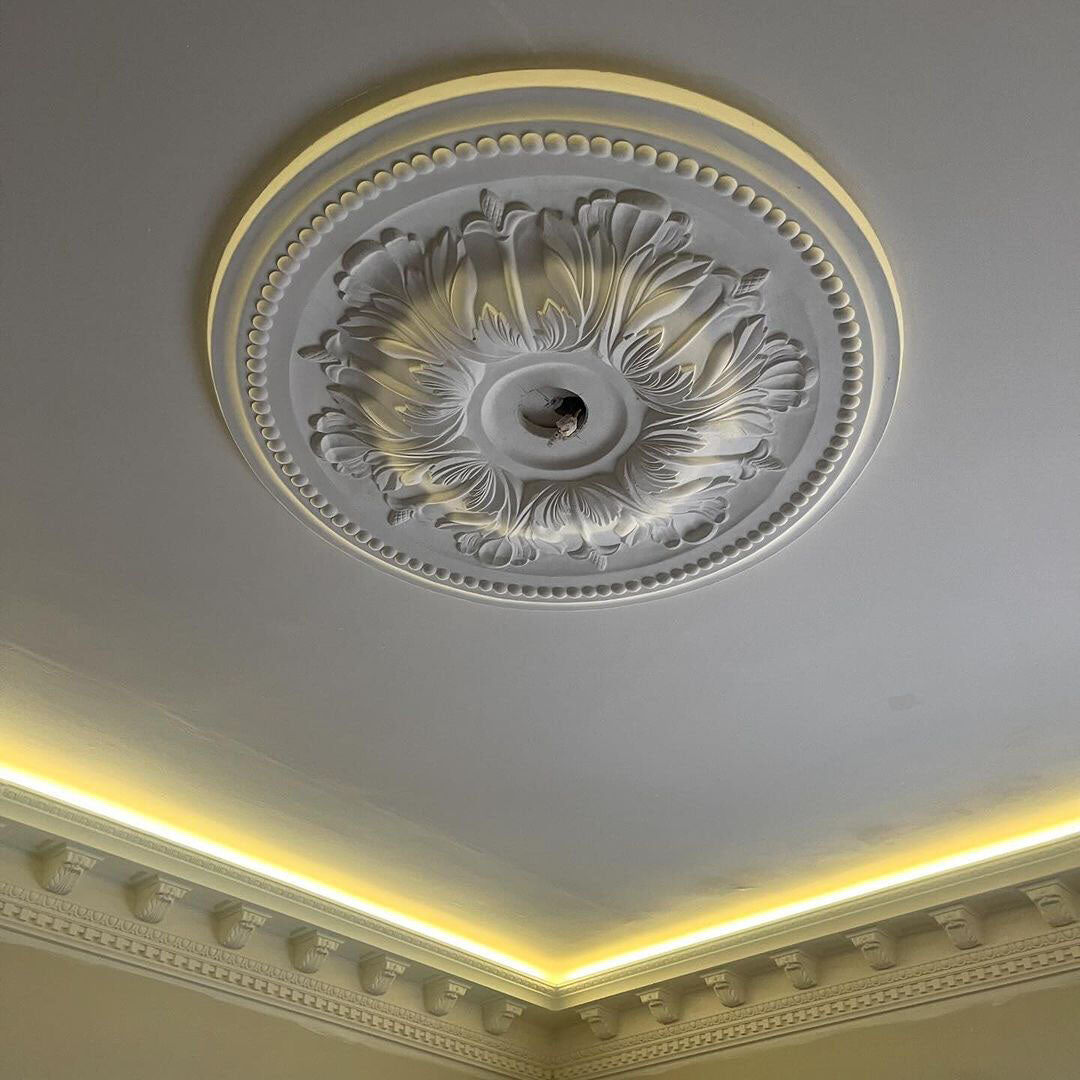 Handcrafted ceiling rose with subtle lighting